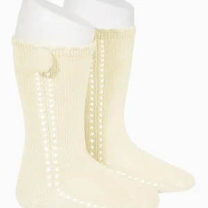 Chaussettes hautes bébé ajourées à pompon – Ecru